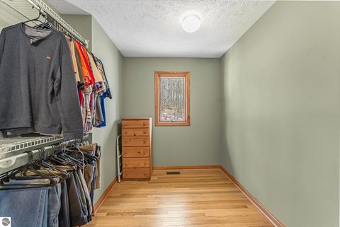 Tiny photo for 9871 E Woodcrest Court #20 & 21, Suttons Bay, MI 49682 (MLS # 1942990)