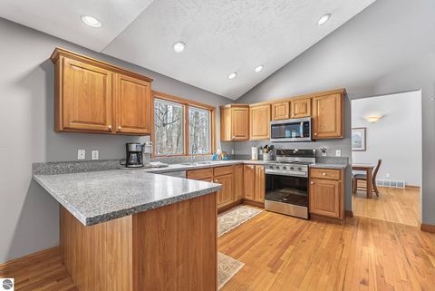 Tiny photo for 9871 E Woodcrest Court #20 & 21, Suttons Bay, MI 49682 (MLS # 1942990)