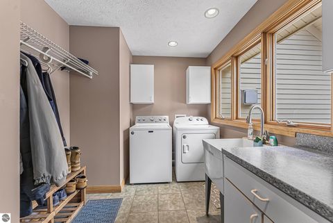 Tiny photo for 9871 E Woodcrest Court #20 & 21, Suttons Bay, MI 49682 (MLS # 1942990)