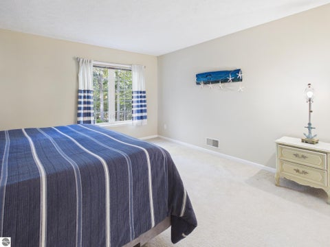 Tiny photo for 12042 S Elk Run #42, Traverse City, MI 49684 (MLS # 1951842)