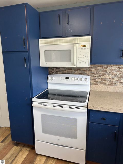 Tiny photo for 413 W 4th Street, Pinconning, MI 48650 (MLS # 1943294)