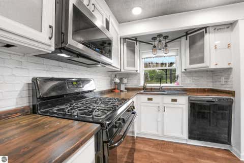 Tiny photo for 4535 Norton Road, Grawn, MI 49637 (MLS # 1946412)
