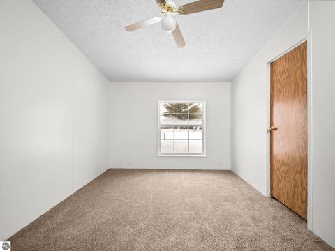 Tiny photo for 303 S Orange Street, Kalkaska, MI 49646 (MLS # 1942238)