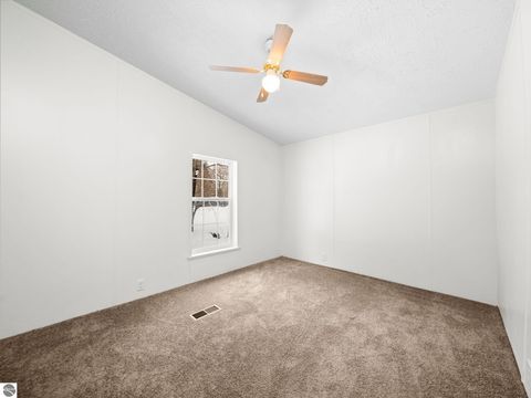 Tiny photo for 303 S Orange Street, Kalkaska, MI 49646 (MLS # 1942238)