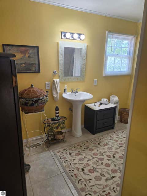 Tiny photo for 557 Townline Road, Tawas City, MI 48763 (MLS # 1947328)