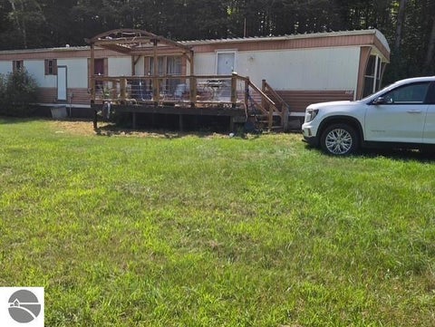 Photo of 153 N Derenzy Road, Central Lake, MI 49622 (MLS # 1949362)