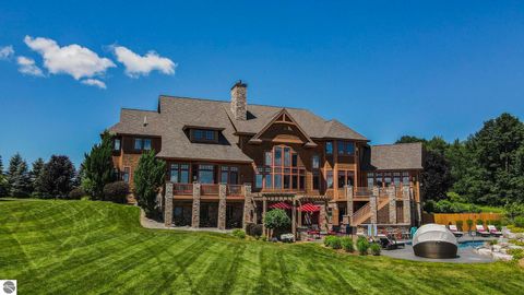 Photo of 11825 Russell Ridge Drive, Williamsburg, MI 49690 (MLS # 1942869)