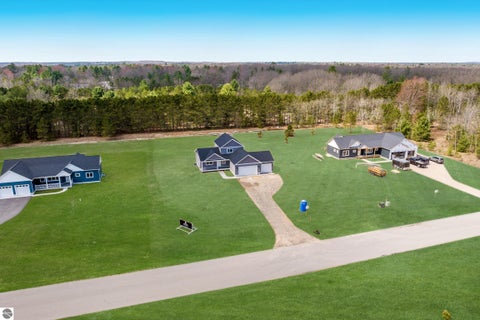 Tiny photo for 1718 Mary Lou Manor MNR #5, Interlochen, MI 49643 (MLS # 1944237)