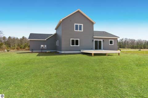 Tiny photo for 1718 Mary Lou Manor MNR #5, Interlochen, MI 49643 (MLS # 1944237)