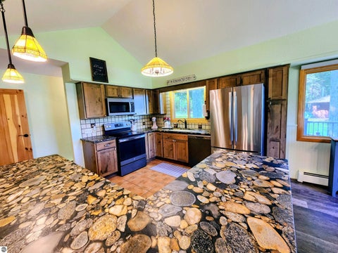 Tiny photo for 6075 Cedar River Road, Mancelona, MI 49659 (MLS # 1945838)