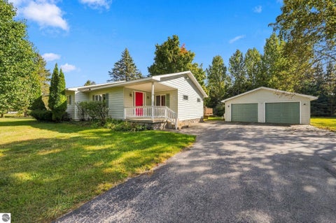 Photo of 406 E Third ST, Elk Rapids, MI 49629 (MLS # 1951367)