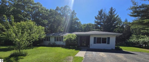 Photo of 704 Forest Road, Oscoda, MI 48750 (MLS # 1947569)