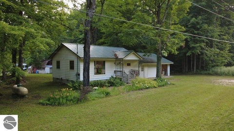 Photo of 7769 Covert Road, Mancelona, MI 49659 (MLS # 1948249)