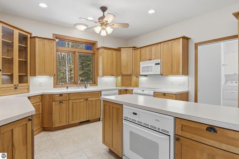 Tiny photo for 410 Golden Beach Drive, Kewadin, MI 49648 (MLS # 1943423)