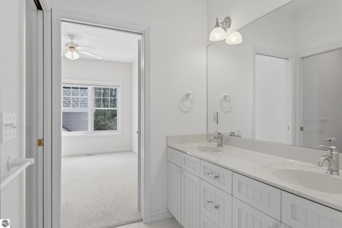 Tiny photo for 410 Golden Beach Drive, Kewadin, MI 49648 (MLS # 1943423)