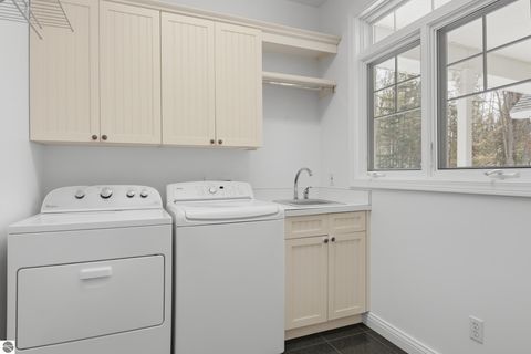 Tiny photo for 410 Golden Beach Drive, Kewadin, MI 49648 (MLS # 1943423)