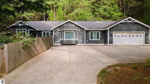 Photo of 4834 Williamsburg Road, Williamsburg, MI 49690 (MLS # 1945872)