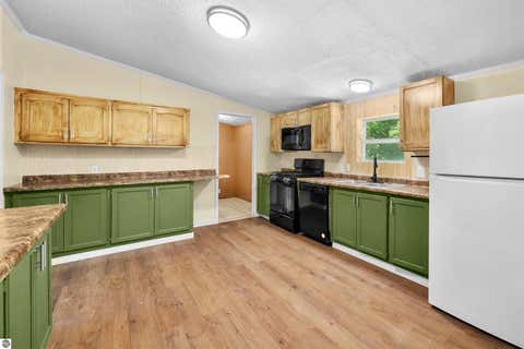 Tiny photo for 5244 NW Westhaven Drive, Rapid City, MI 49676 (MLS # 1948874)