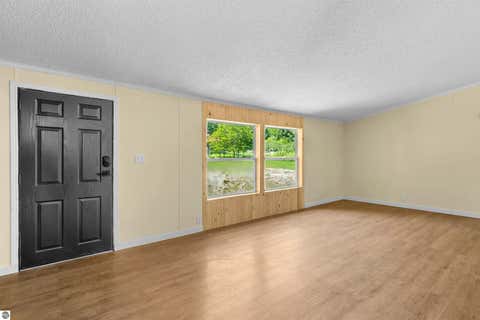 Tiny photo for 5244 NW Westhaven Drive, Rapid City, MI 49676 (MLS # 1948874)