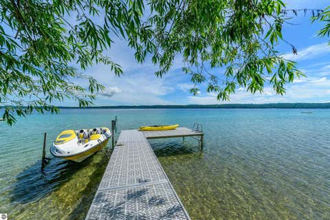 Tiny photo for 12246 Pineridge Trail, Kewadin, MI 49648 (MLS # 1947261)