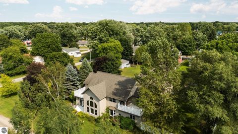 Tiny photo for 211 Bluff Avenue, Eastlake, MI 49626 (MLS # 1943060)