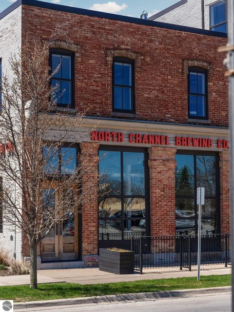 Tiny photo for 86 Washington Avenue #211, Manistee, MI 49660 (MLS # 1944263)