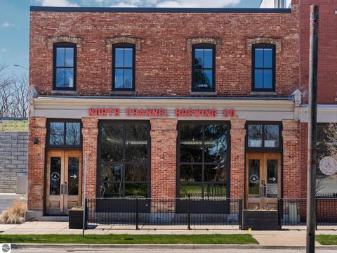 Tiny photo for 86 Washington Avenue #211, Manistee, MI 49660 (MLS # 1944263)