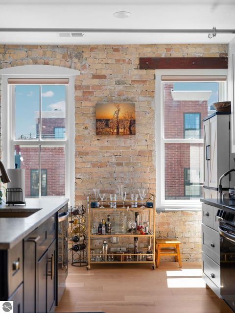 Tiny photo for 86 Washington Avenue #211, Manistee, MI 49660 (MLS # 1944263)