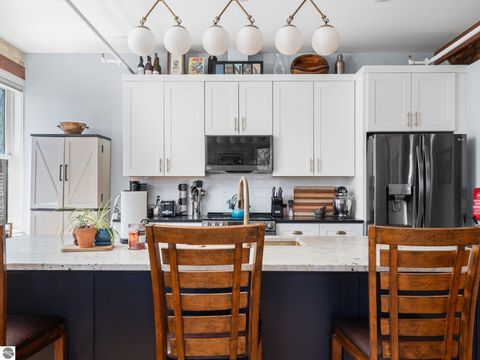 Tiny photo for 86 Washington Avenue #211, Manistee, MI 49660 (MLS # 1944263)