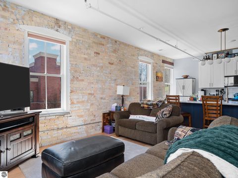 Tiny photo for 86 Washington Avenue #211, Manistee, MI 49660 (MLS # 1944263)