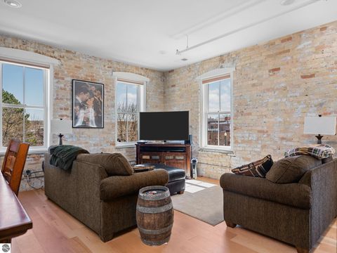 Tiny photo for 86 Washington Avenue #211, Manistee, MI 49660 (MLS # 1944263)