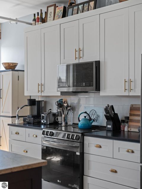 Tiny photo for 86 Washington Avenue #211, Manistee, MI 49660 (MLS # 1944263)