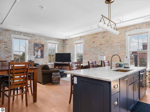 Tiny photo for 86 Washington Avenue #211, Manistee, MI 49660 (MLS # 1944263)