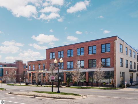 Tiny photo for 86 Washington Avenue #211, Manistee, MI 49660 (MLS # 1944263)