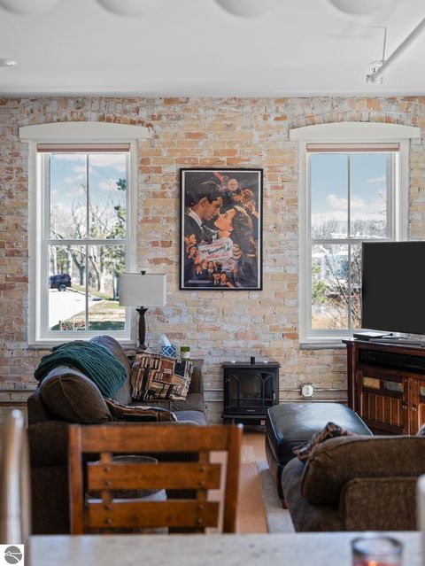 Tiny photo for 86 Washington Avenue #211, Manistee, MI 49660 (MLS # 1944263)