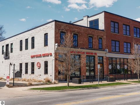 Tiny photo for 86 Washington Avenue #211, Manistee, MI 49660 (MLS # 1944263)