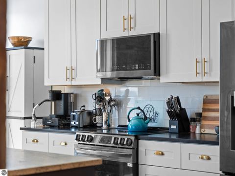 Tiny photo for 86 Washington Avenue #211, Manistee, MI 49660 (MLS # 1944263)