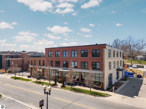 Tiny photo for 86 Washington Avenue #211, Manistee, MI 49660 (MLS # 1944263)