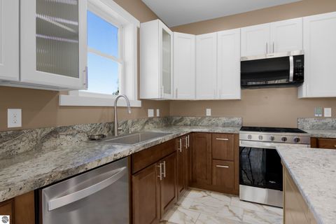 Photo of 6533 Jeffrey Place, Grawn, MI 49637 (MLS # 1943642)