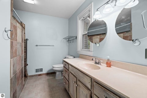 Tiny photo for 5763 MacKenzie Drive, Kewadin, MI 49648 (MLS # 1951718)