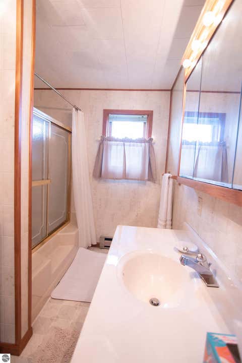 Tiny photo for 148 N Huron #1, Detour Village, MI 49725 (MLS # 1943343)