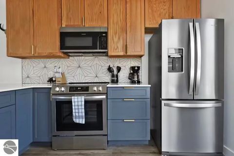 Tiny photo for 1825 E Eighth Street #104, Traverse City, MI 49686 (MLS # 1941539)