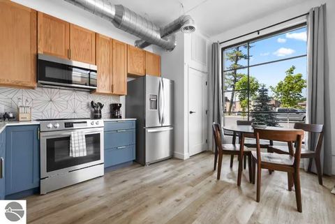 Tiny photo for 1825 E Eighth Street #104, Traverse City, MI 49686 (MLS # 1941539)