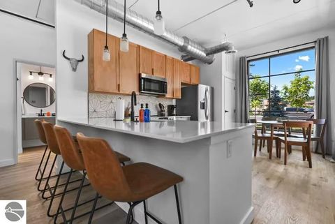 Tiny photo for 1825 E Eighth Street #104, Traverse City, MI 49686 (MLS # 1941539)