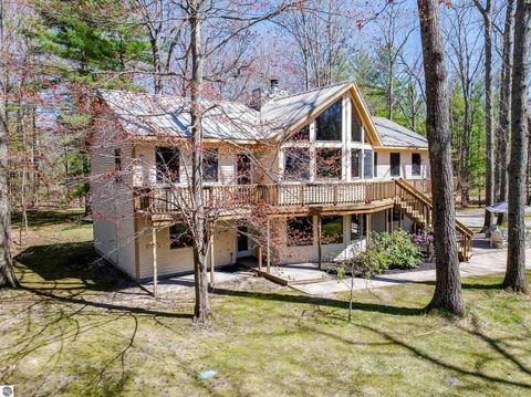 Photo of 125 Dubonnet Trail, Interlochen, MI 49643 (MLS # 1945012)