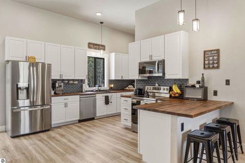 Tiny photo for 7980 Springwater Drive, Rapid City, MI 49676 (MLS # 1944438)