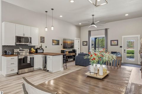 Tiny photo for 7980 Springwater Drive, Rapid City, MI 49676 (MLS # 1944438)