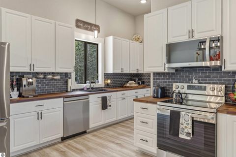 Tiny photo for 7980 Springwater Drive, Rapid City, MI 49676 (MLS # 1944438)