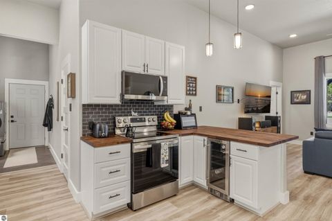 Tiny photo for 7980 Springwater Drive, Rapid City, MI 49676 (MLS # 1944438)