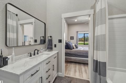 Tiny photo for 7980 Springwater Drive, Rapid City, MI 49676 (MLS # 1944438)